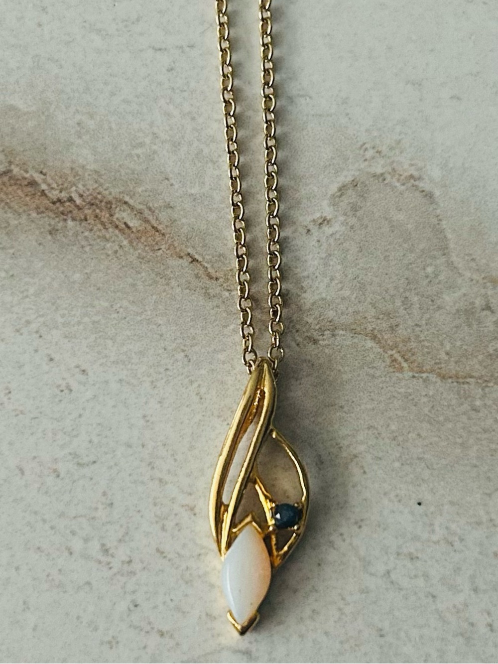 Vintage Gold Toned Marque Milky Iridescent Pendant Necklace Navy Accent Stone